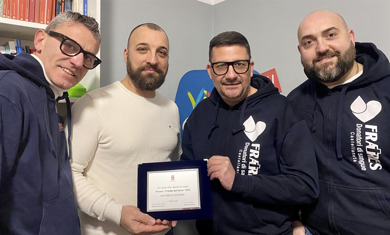 I tre premiati con il presidente Palmisano